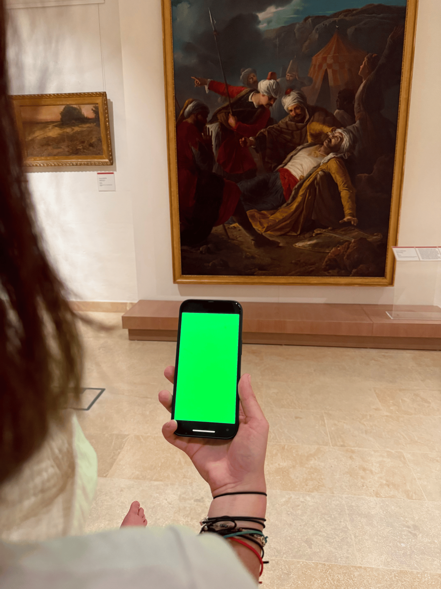 Pocket Guest app showing museum tour on smartphone